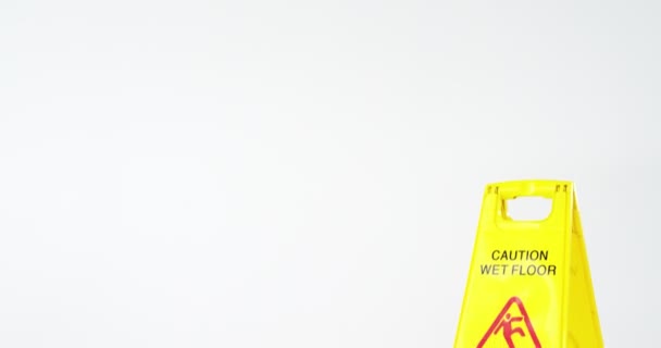 Wet floor caution sign — Stock Video
