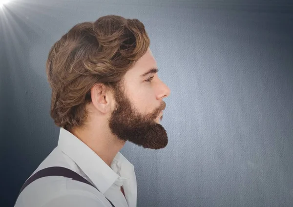 Composietbeeld van Man met baard tegen Marine achtergrond met flare — Stockfoto