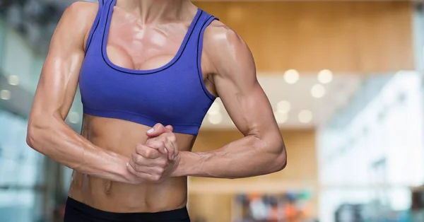 Fitness woman Torso making exercises in a gym — Stock Photo, Image