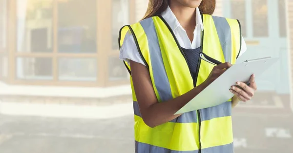 Composite image of Architect Torso on building construction site — Stock Photo, Image