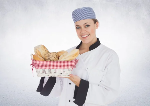 Chef-kok met brood tegen witte achtergrond — Stockfoto