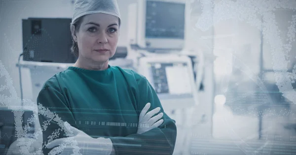 Surgeon standing with arms crossed — Stock Photo, Image