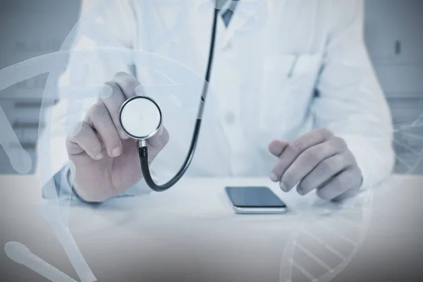 Doctor holding stethoscope — Stock Photo, Image