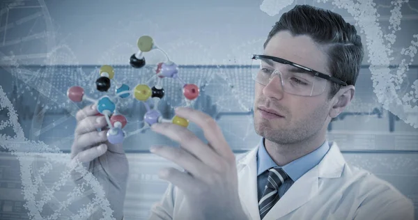 Scientist experimenting molecule structure — Stock Photo, Image