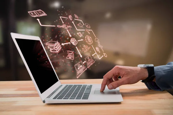 Businessman scrolling laptop mouse — Stock Photo, Image