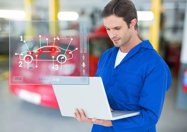 Auto monteur met behulp van laptop — Stockfoto