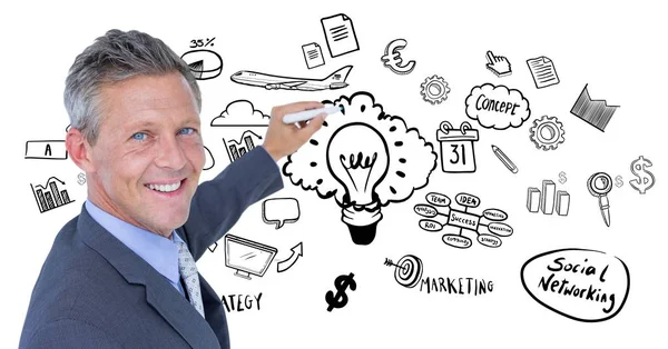 Affärsman ritning mot business doodles — Stockfoto