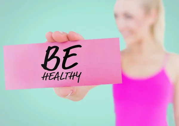 Woman holding placard with text be healthy — Stock Photo, Image