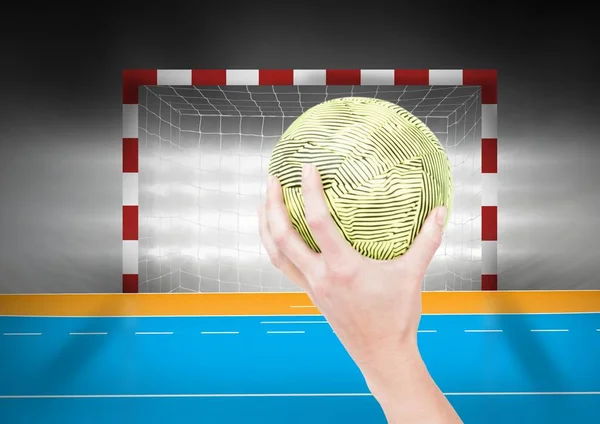 Sportler wirft Handball gegen Torpfosten — Stockfoto