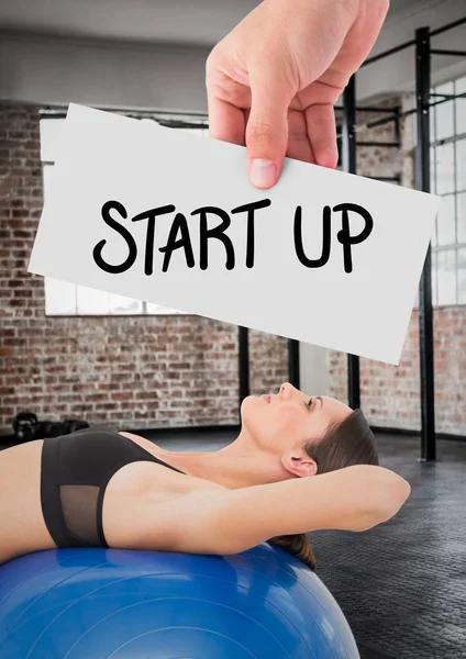 Woman hand showing start up card — Stock Photo, Image