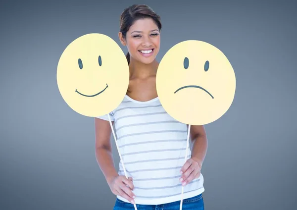 Mulher alegre segurando rosto sorridente e triste — Fotografia de Stock