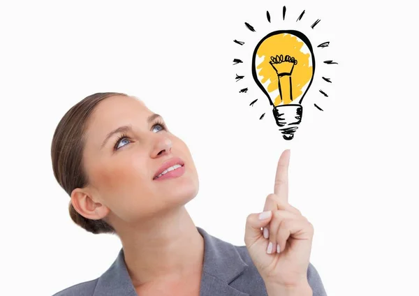 Woman looking at graphic light bulb Stock Photo