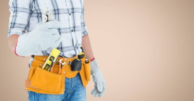 Handy man standing with tools clipart
