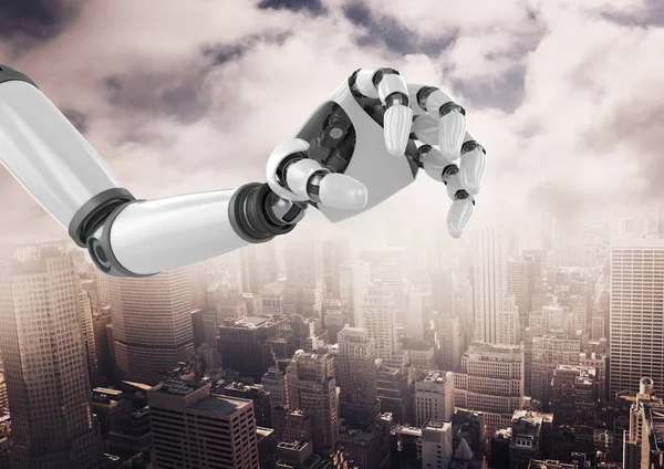 Robot hand over cityscape — Stock Photo, Image