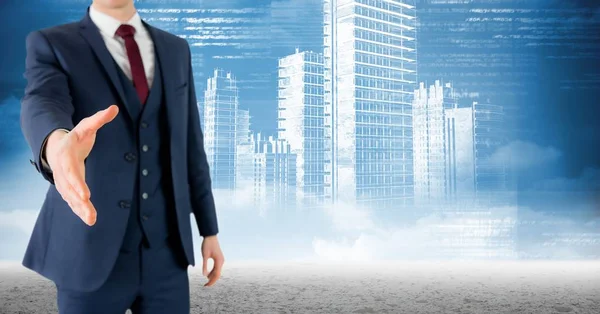 Businessman offering hand for handshake with skyscrapers in background — Stock Photo, Image