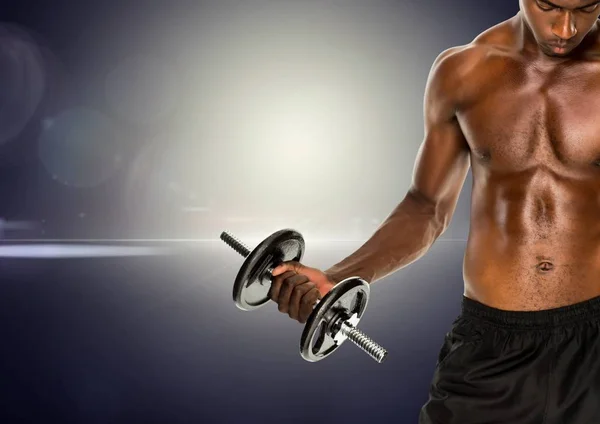 Fit man lifting dumbbell — Stock Photo, Image