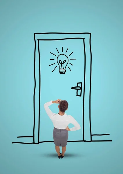 Businesswoman looking drawn door and light bulb — Stock Photo, Image