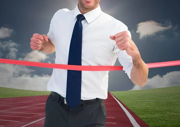 Empresário ganhando a corrida — Fotografia de Stock