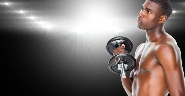 Hombre sano haciendo ejercicio con campanas mudas —  Fotos de Stock