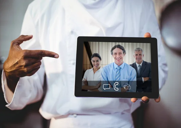 Businessman having video call with colleagues — Stock Photo, Image