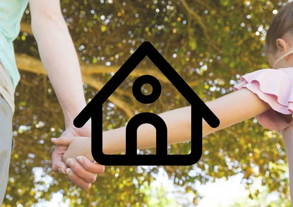 Matka drží ruku dívky s tvar domu — Stock fotografie