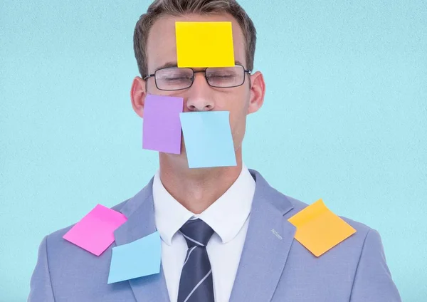 Businessman with black sticky notes on face — Stock Photo, Image