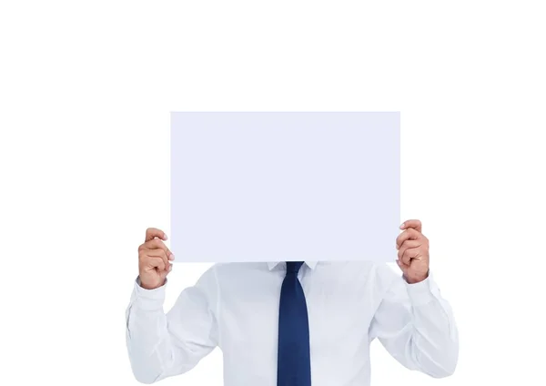 Businessman holding a blank placard in front of his face Stock Image