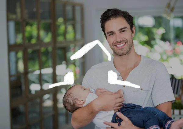 Padre sosteniendo a su bebé en casa —  Fotos de Stock