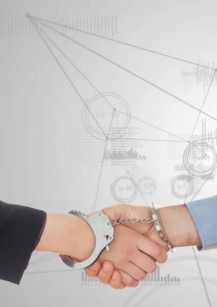 Бизнес-профессионалы пожимают руки наручниками — стоковое фото