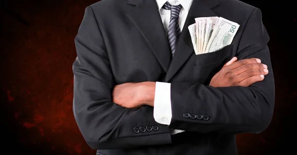 Korrupt üzletember pénzzel a zsebében. — Stock Fotó