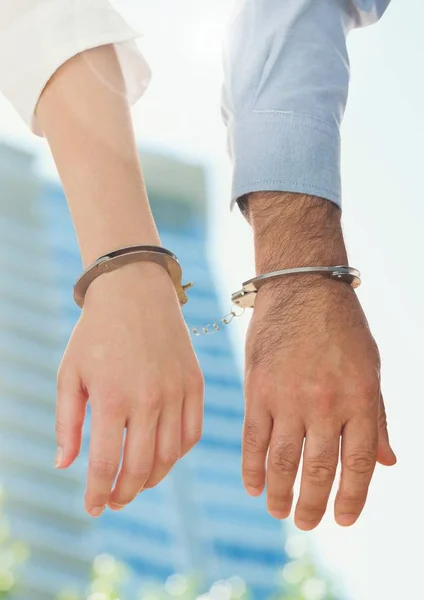 Business people handcuffed together — Stock Photo, Image