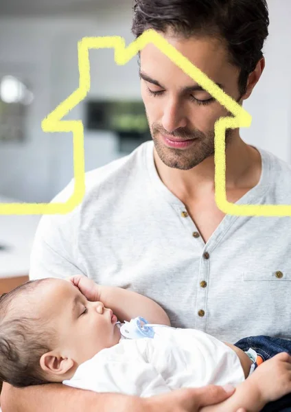 Mann hält Baby mit Hausgestalt überlagert — Stockfoto