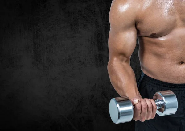 Fit man lifting dumbbells — Stock Photo, Image