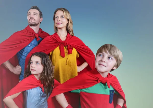 Super family wearing red cape — Stock Photo, Image