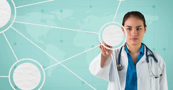 Female doctor pretending to touch an invisible screen against world map in background — Stock Photo, Image