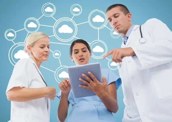 Doctors discussing over digital tablet — Stock Photo, Image