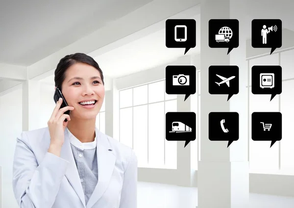 Businesswoman talking on mobile phone next — Stock Photo, Image