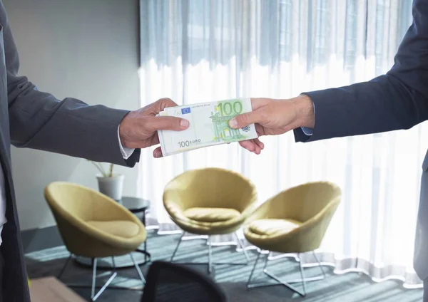 Corrupt businessmen hands giving and receiving money — Stock Photo, Image