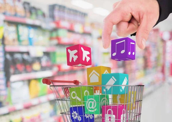 Hand on man putting music icon in shopping cart — Stock Photo, Image