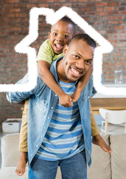 Man carrying his son on his shoulder — Stock Photo, Image