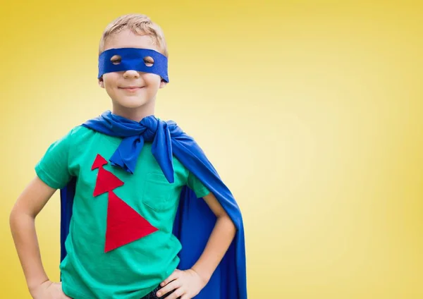 Boy in superhero costume standing with his hands on his waist — Stock Photo, Image