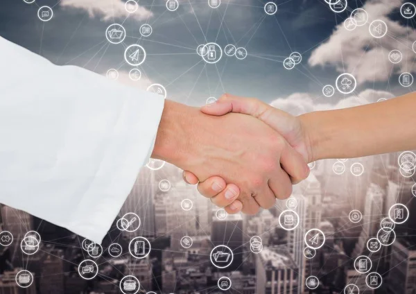 Close-up of businessman and woman shaking hands with each other — Stock Photo, Image