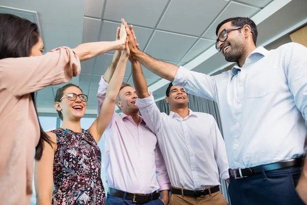 Business colleagues giving high five — Stock Photo, Image