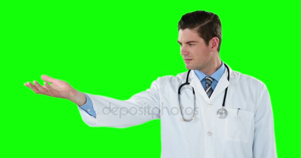 Dokter berpura-pura memegang benda tak terlihat. — Stok Video