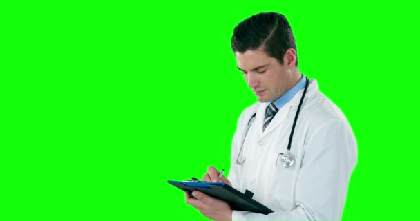 Doctor writing on the clipboard — Stock Video