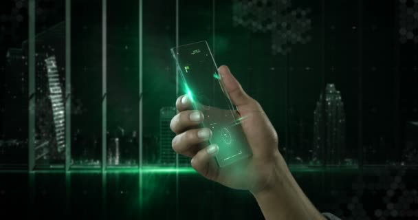 Mano che tiene il telefono cellulare futuristico sullo sfondo generato digitalmente — Video Stock