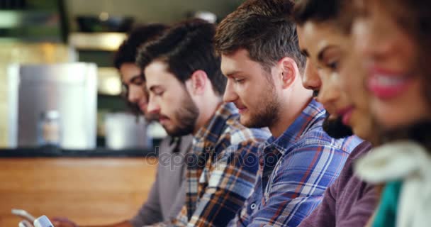 Group of friends using mobile phone — Stock Video