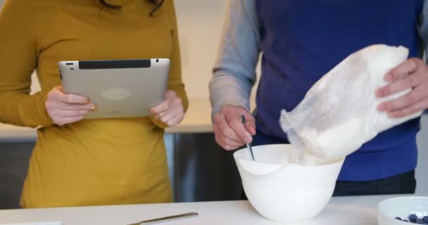 Mid-section of man mixing dough in bowl — Stock Video