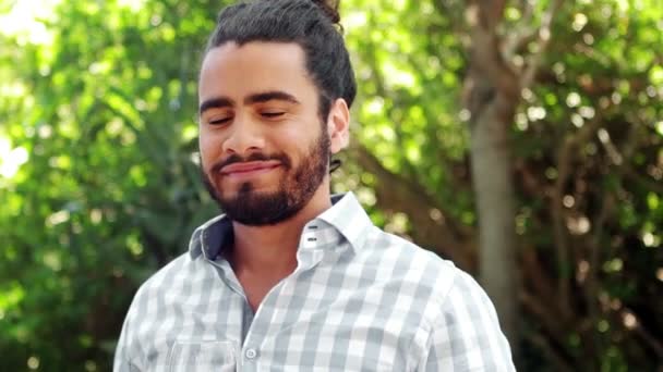 Smiling man drinking glass of red wine — Stock Video