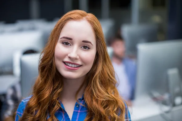 Portrait of female executive in office — Stock Photo, Image